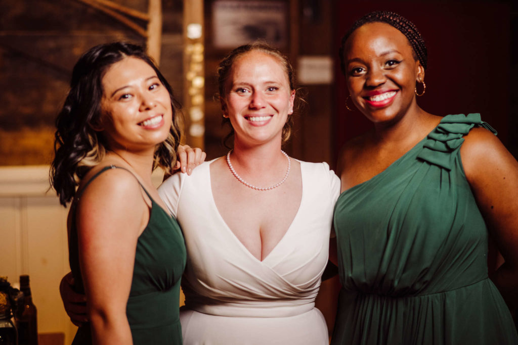 A bride and her bridesmaids pose during her Salem Herbfarm wedding.