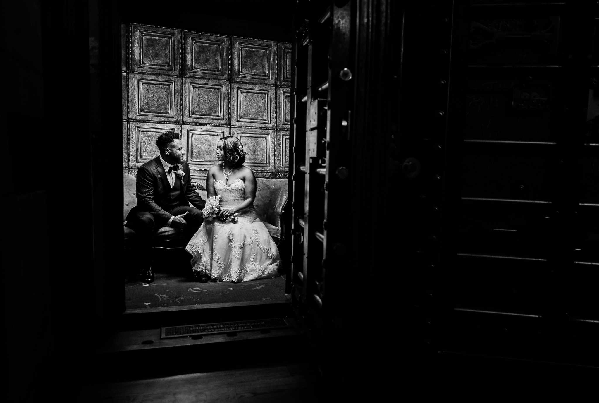 A bride and groom look at each other in their Hartford wedding venue.