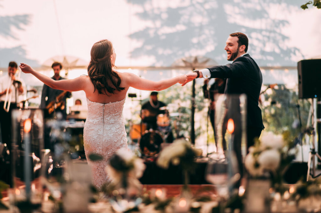 At one of the top 10 wedding venues in Connecticut, a bride and groom dance at Lion Rock Farm.