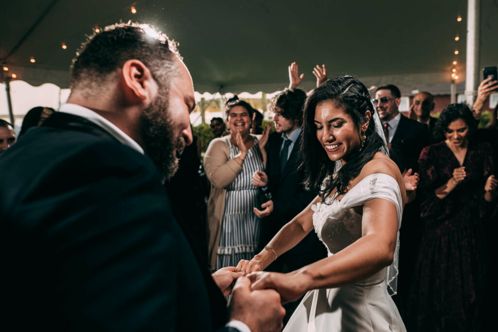 A bride and groom dance together during their Essex CT wedding.