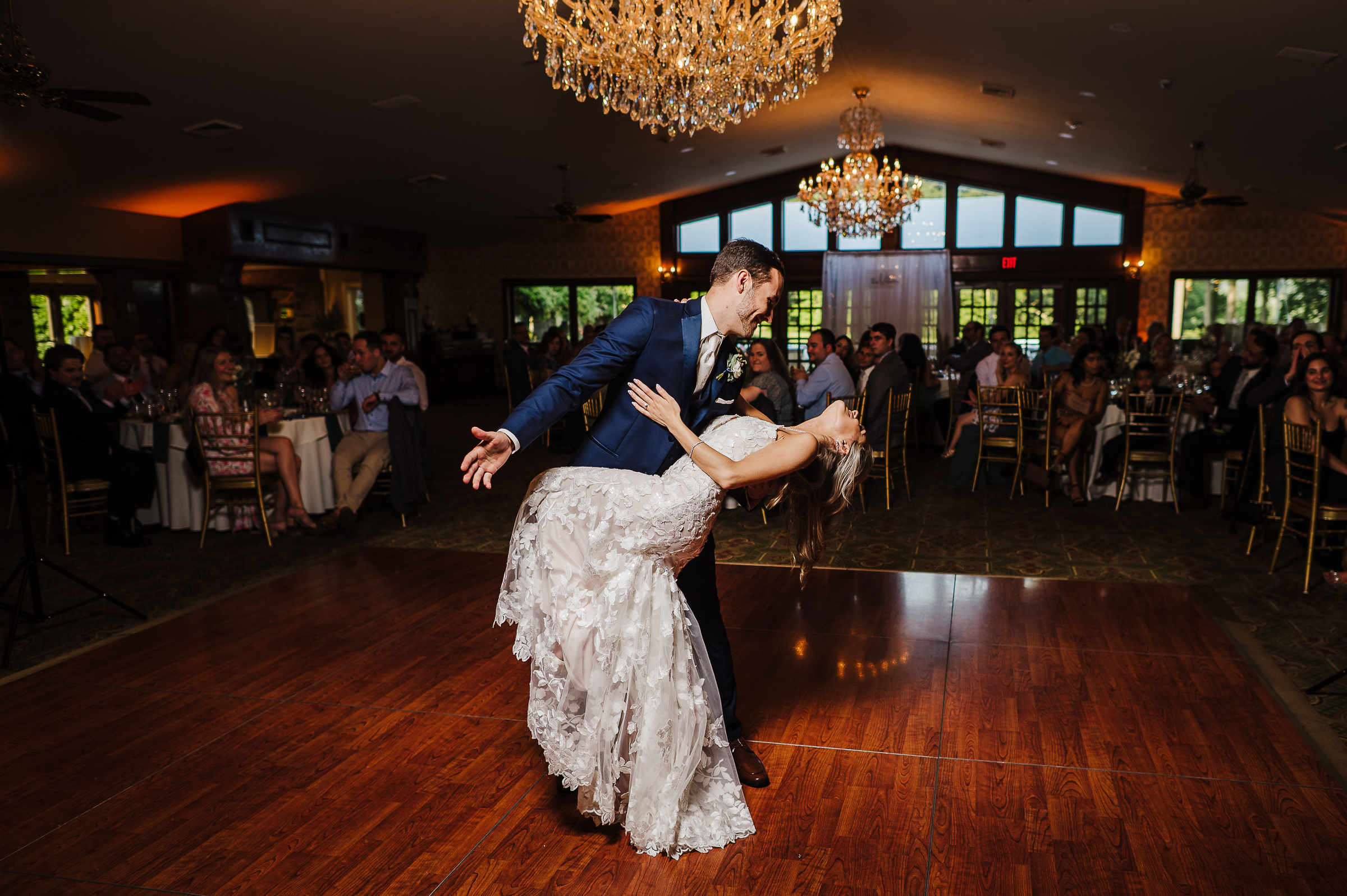 A couple enjoys their first dance during their ballroom wedding in Connecticut.