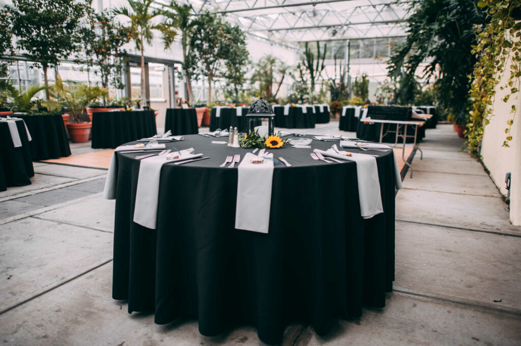 A table is setup for a Roger Williams Botanical Garden wedding reception.