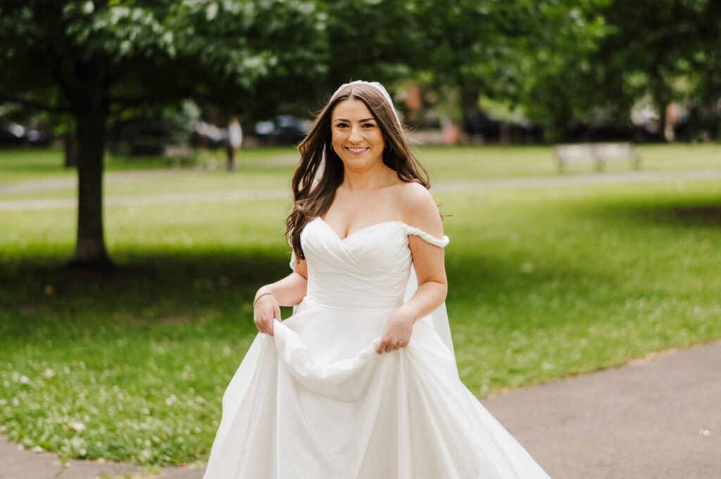 A bride on her way to her elopement in Connecticut park Wooster Square.