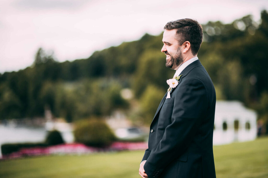 The groom awaits the bride for their first look during their Candlewood Inn wedding.