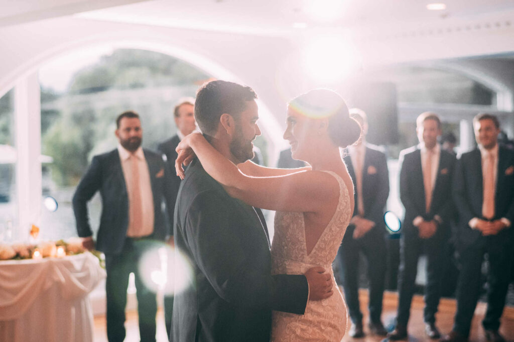 A bride and groom enjoy their first dance inside the ballroom during their Candlewood Inn wedding.