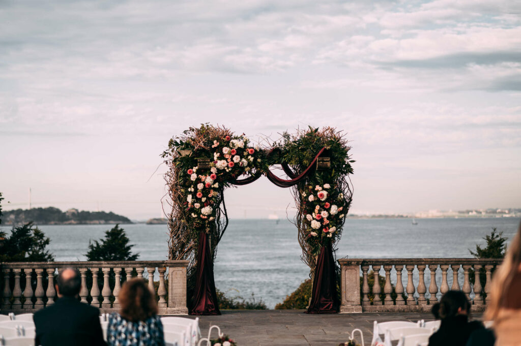 The Castle Hill Inn ceremony patio is pictured with Narragansett Bay in the background.